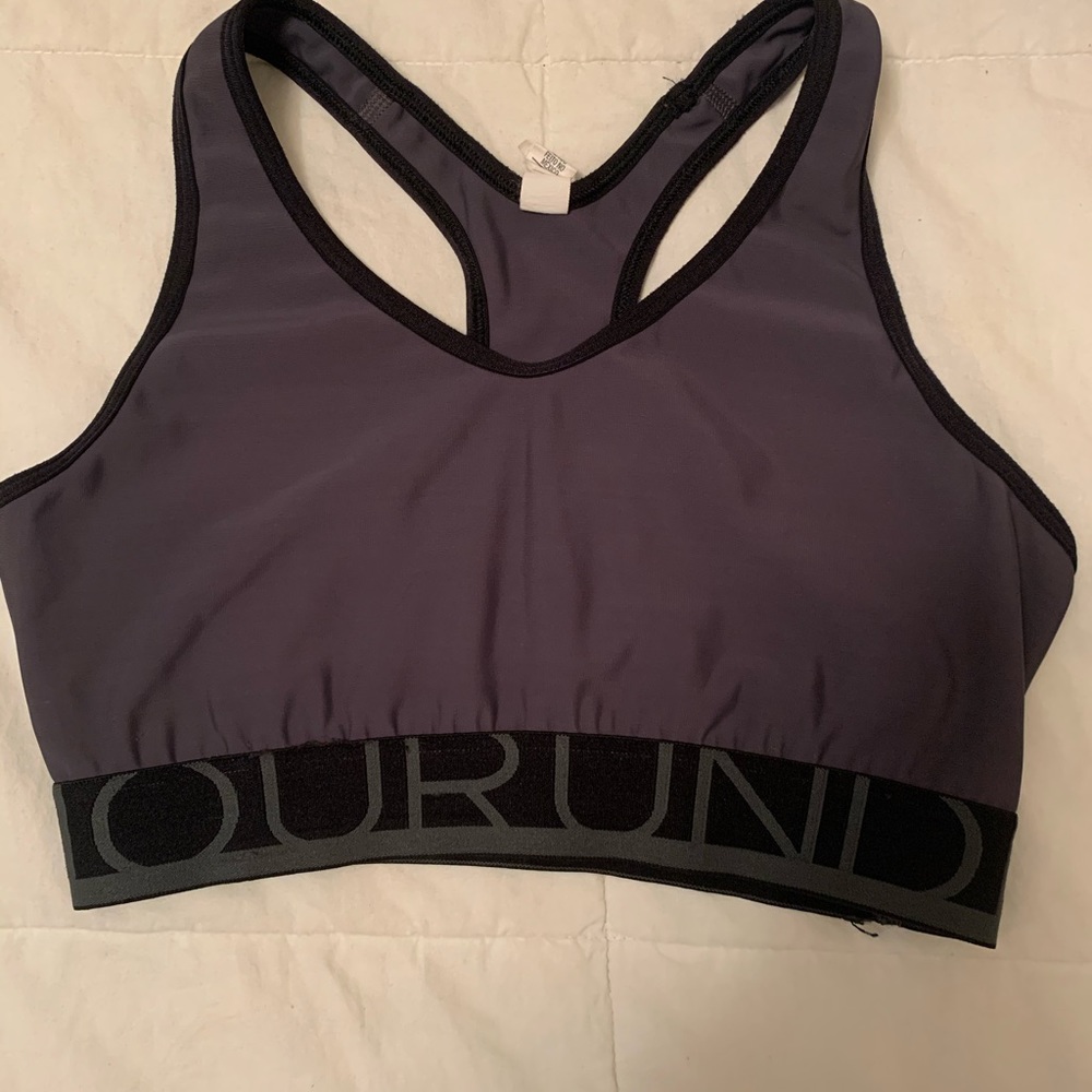 Under Armour sports bra in charcoal. Size small.